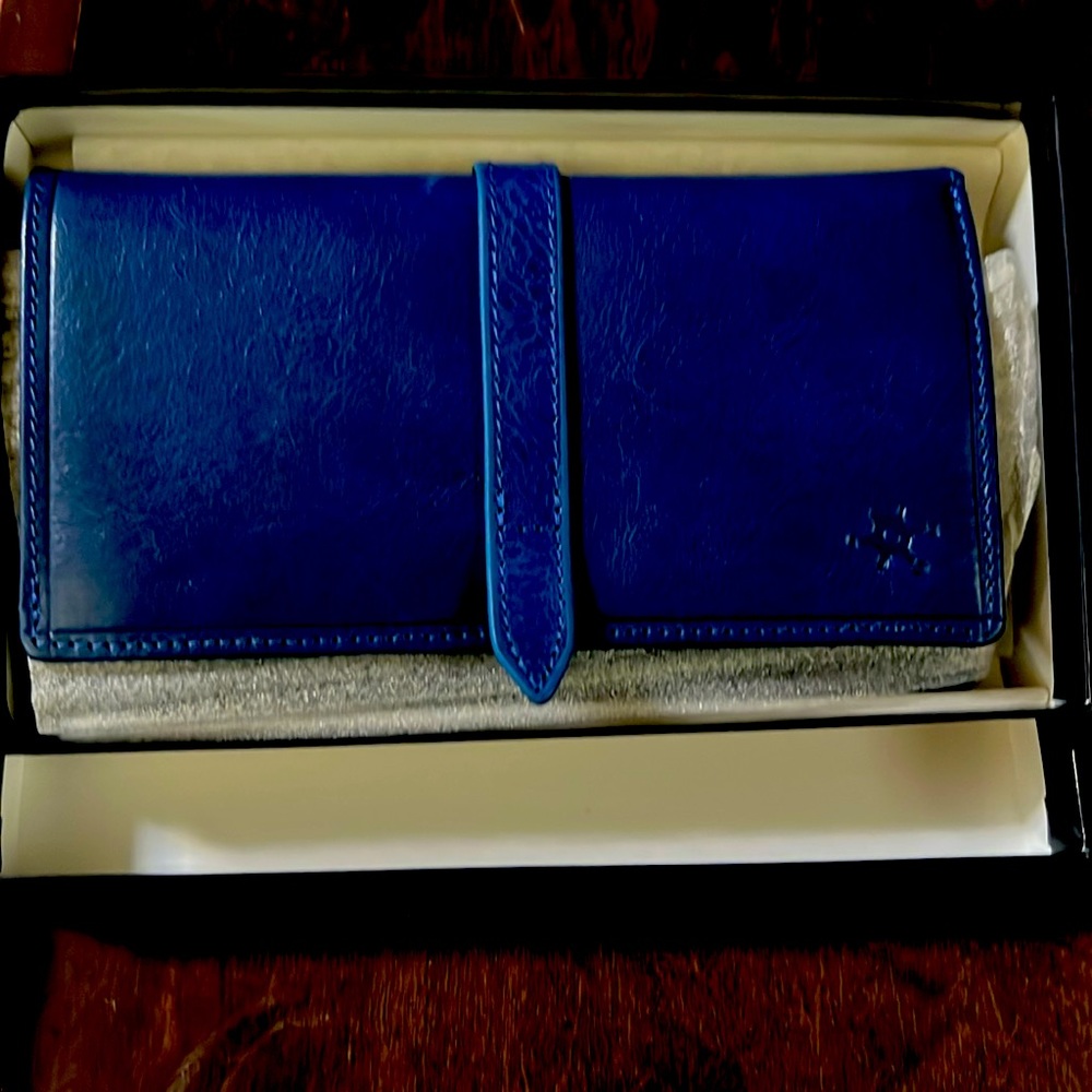 NEW. Italian leather wallet handmade in Rome. Large enough to carry a checkbook.